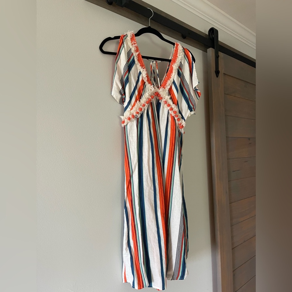 Worn once perfect summer dress; striped with V dip front and back; size small